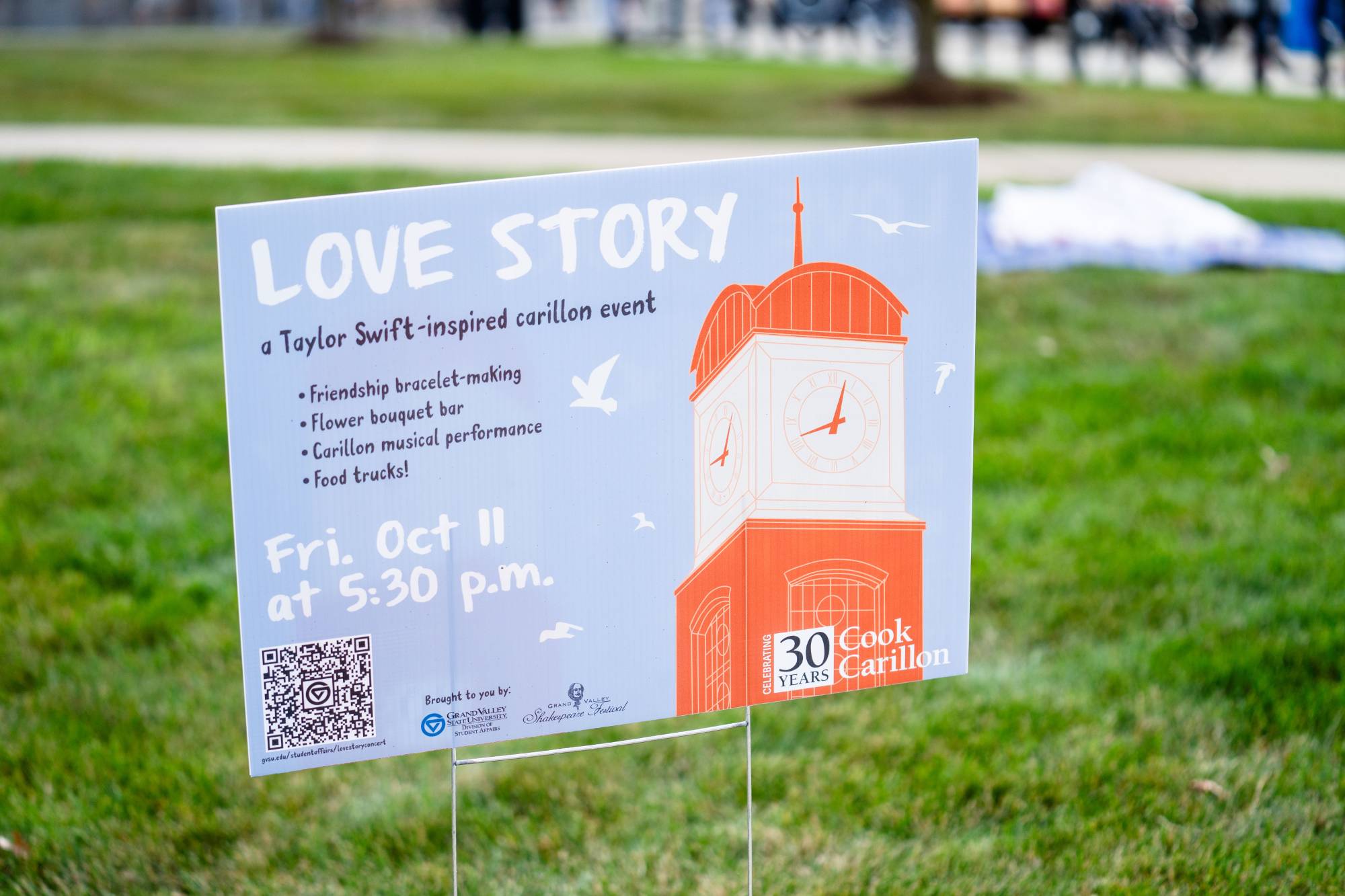 Yard sign promoting Cook Carillon Tower Concert